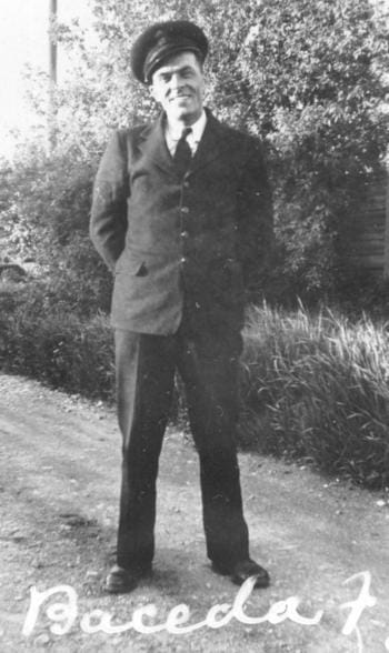 Frank Baceda smiling in his WWII Navy uniform.