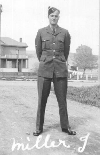 Jack Miller posing for black and white photo in his Air Force uniform, 1940s.