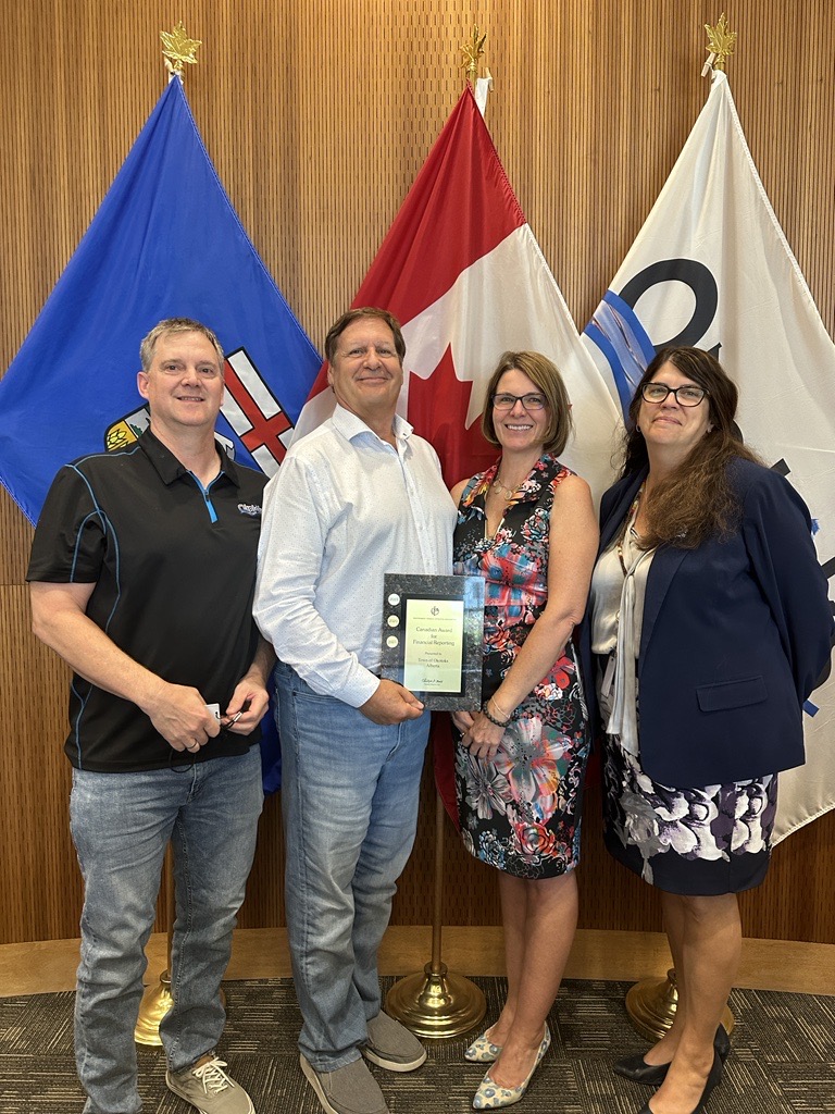 picture of staff and Council holding CAnFR award