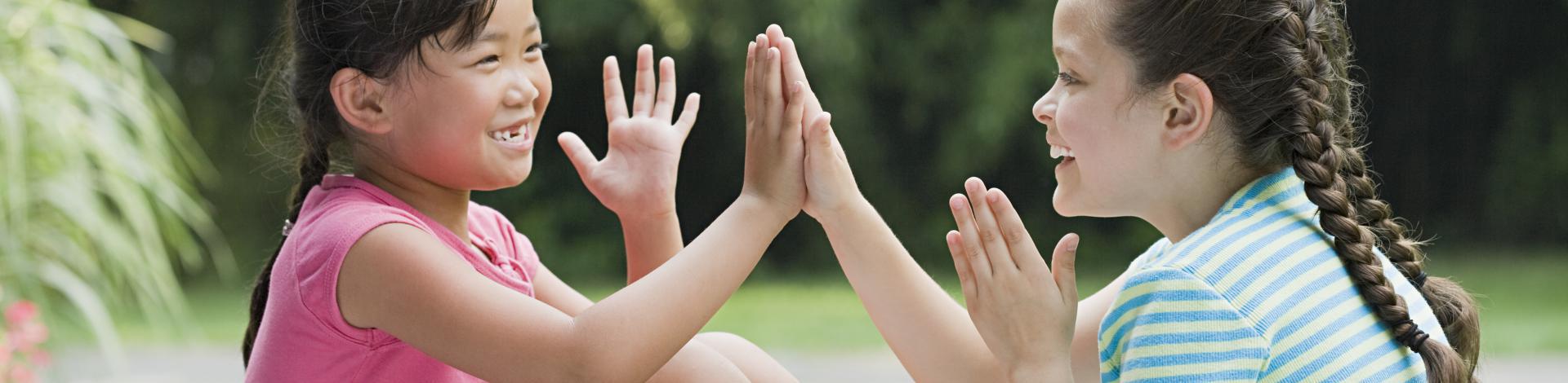 Happy healthy children playing outside