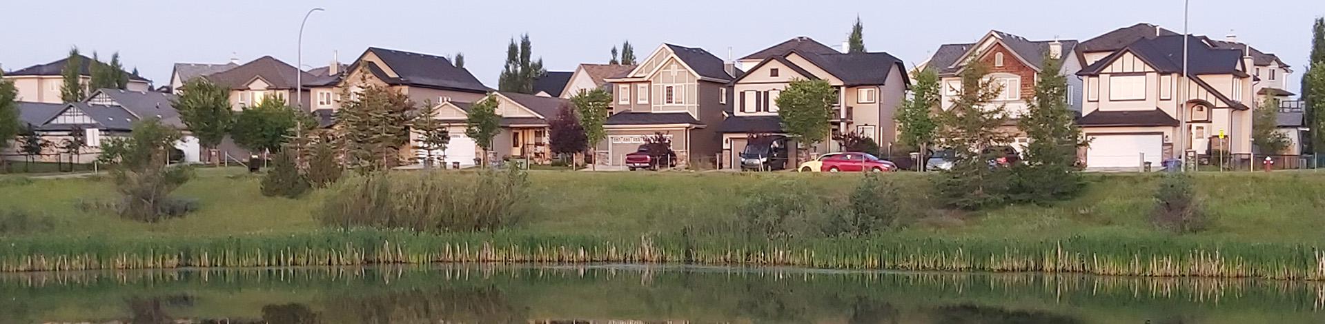 Houses in front of water