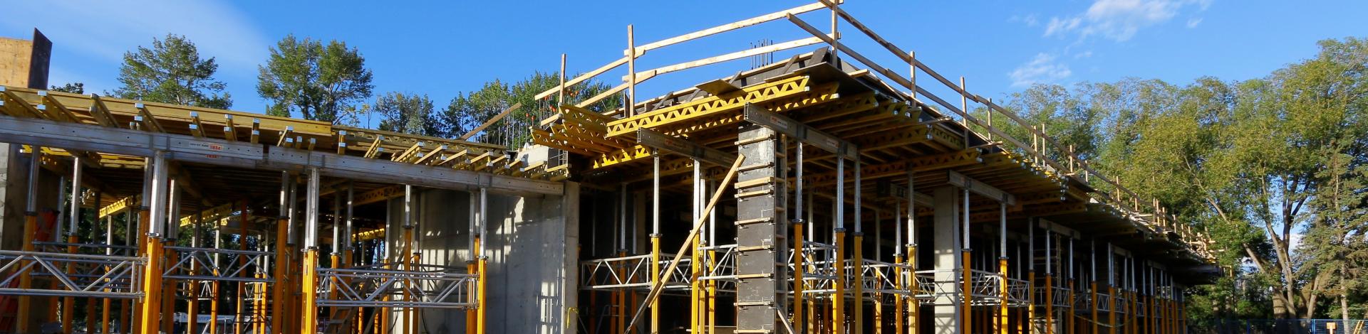 construction shot of Okotoks Arts and Learning campus being built