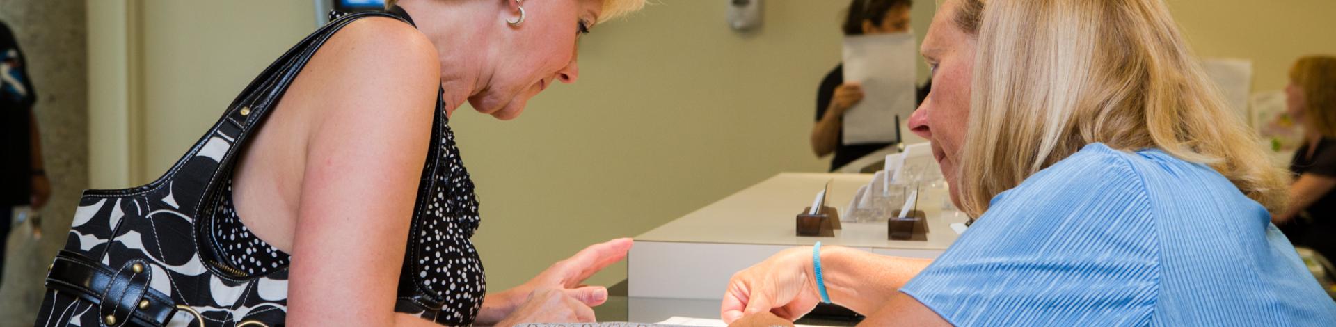 Customer Service at Municipal Centre - front counter client services helping resident