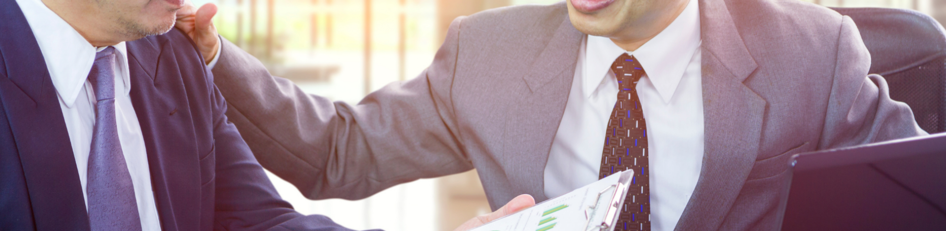 a person tapping another's shoulders