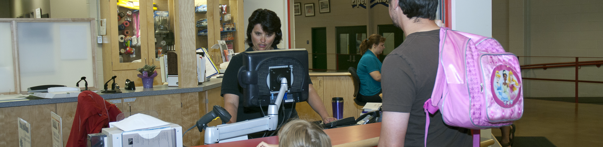 Rec Centre customers checking in at client services