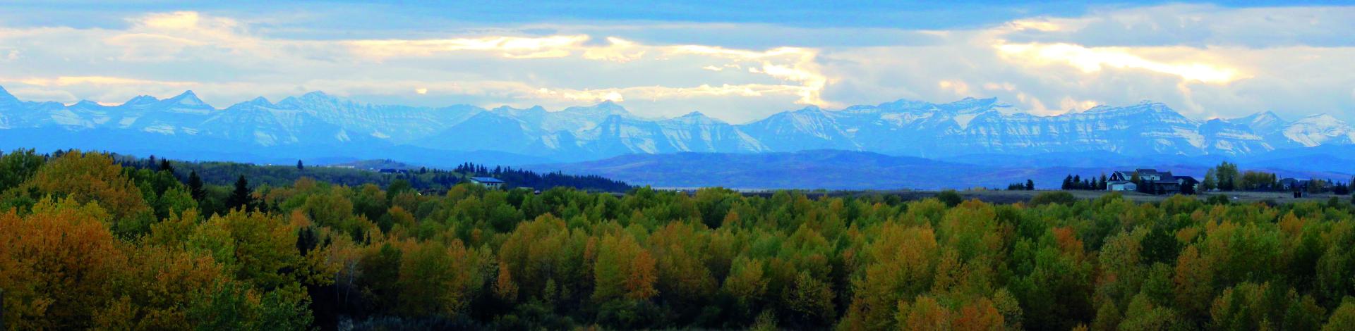 Okotoks Sheep River with Mountains in background