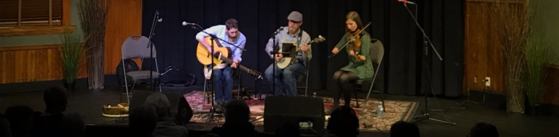 the people play music on a stage