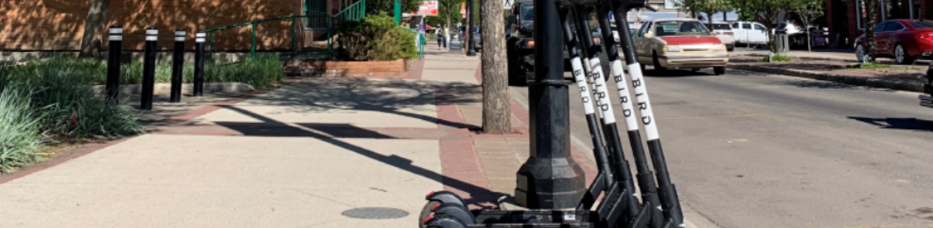 image showing parked e-scooters in Okotoks downtown