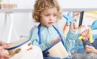 Kindergarten kids playing instuments