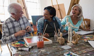cheerful seniors in an art class