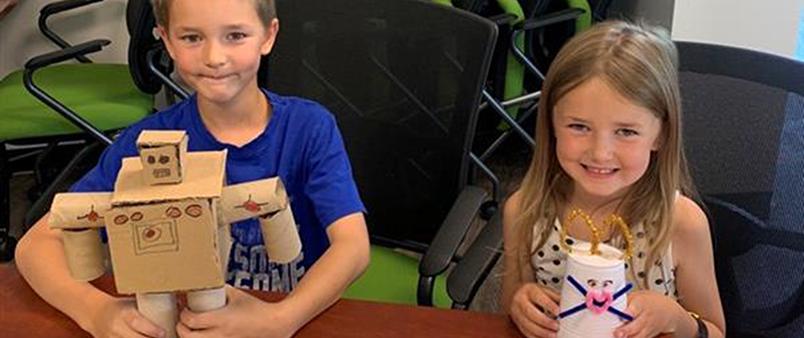 Kids making crafts at nature fridays - robots and animals