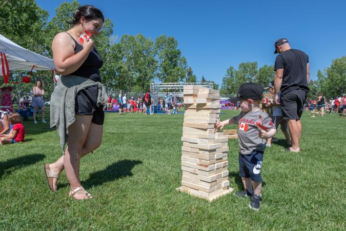 a youth plays a game in a feild 