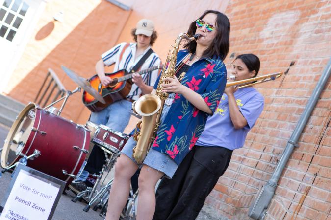 teens playing and busking at buskerfest