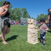 a youth plays a game in a feild 