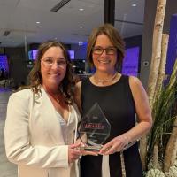 Connie Drake and Mayor Thorn accepting award for Light Up Okotoks