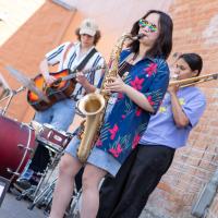 teens playing and busking at buskerfest