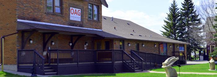 outside of Okotoks Art Gallery in summer