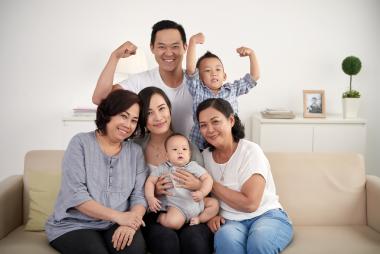 multi-generational family posing for group shot 